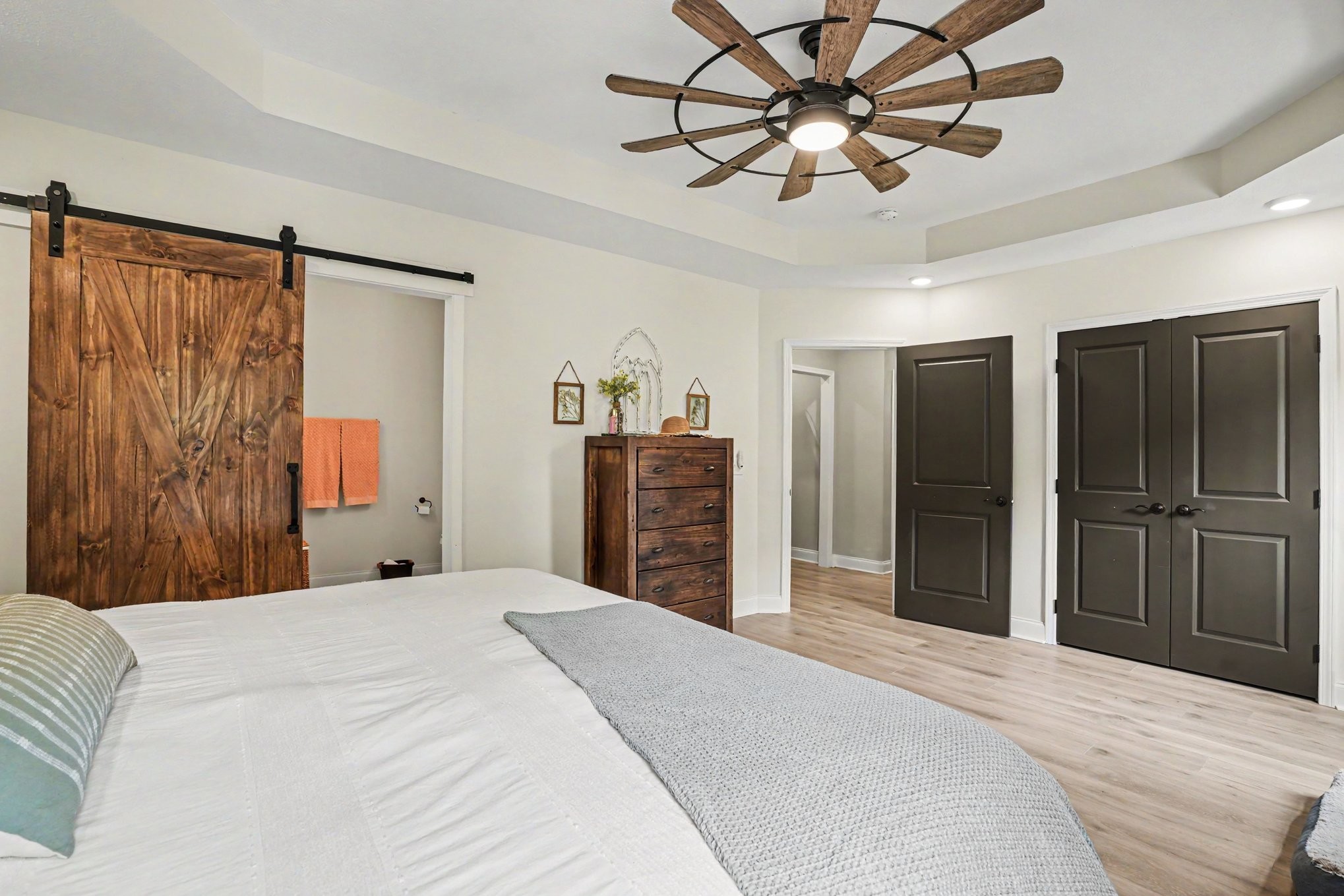 1415 Southside Road Southside, TN 37171 - Photo 16 of 35 a bedroom with a bed and a chandelier