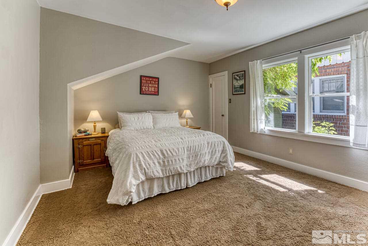 230 Martin Street Reno, NV 89509 - Photo 14 of 38 a bedroom with a bed and window