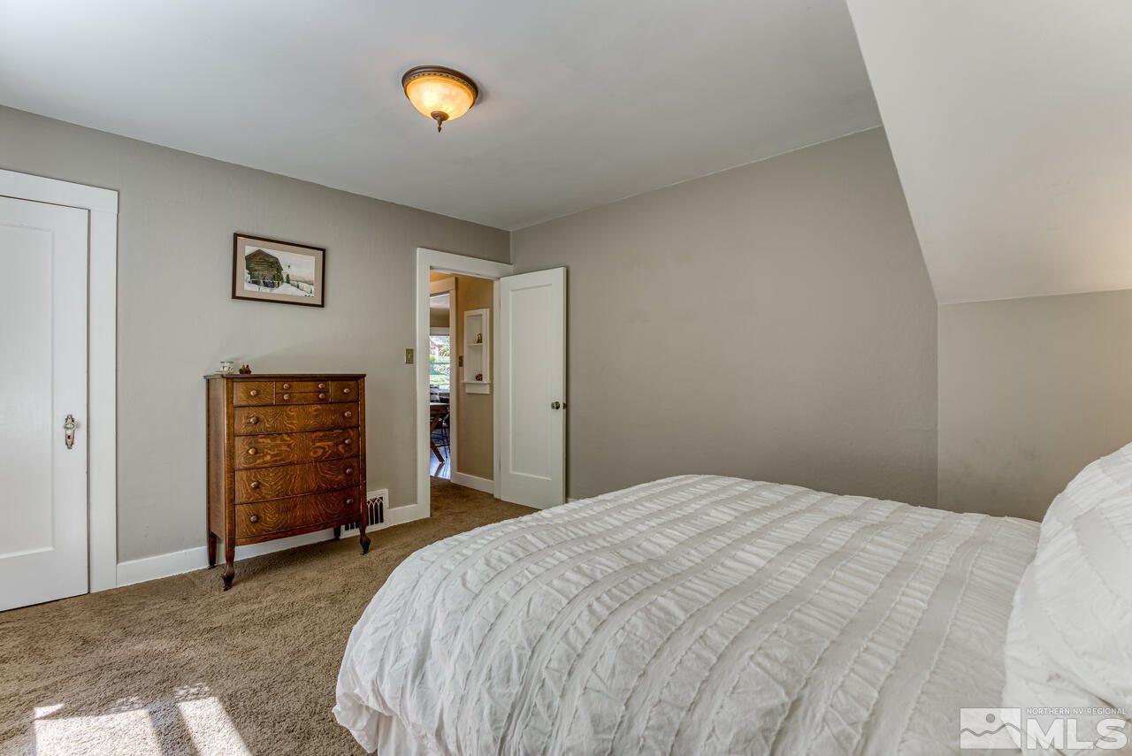 230 Martin Street Reno, NV 89509 - Photo 15 of 38 a bedroom with a bed and a cabinets