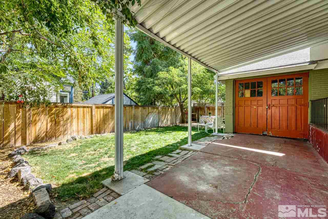 230 Martin Street Reno, NV 89509 - Photo 23 of 38 a view of a backyard with large trees plants and large tree