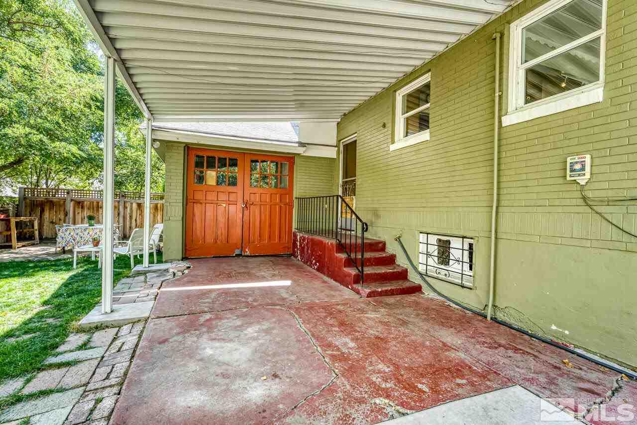 230 Martin Street Reno, NV 89509 - Photo 24 of 38 a front view of a house with a yard