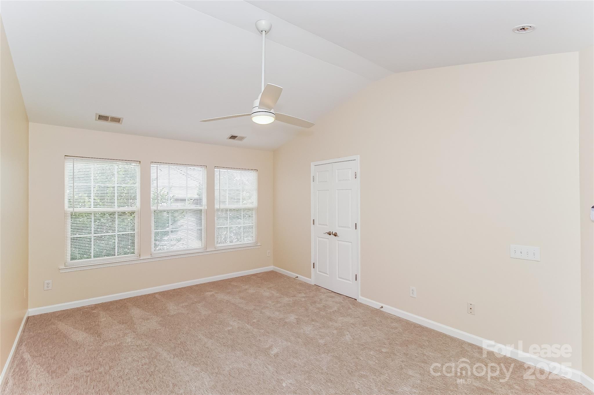 8803 Ormeau Drive Charlotte, NC 28277 - Photo 11 of 17 an empty room with a empty space and windows