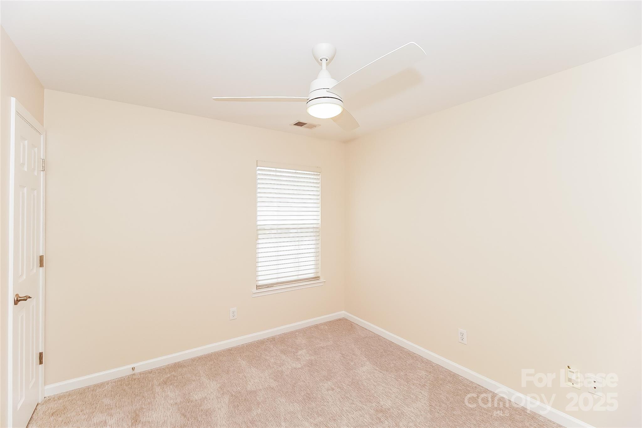 8803 Ormeau Drive Charlotte, NC 28277 - Photo 13 of 17 an empty room with windows