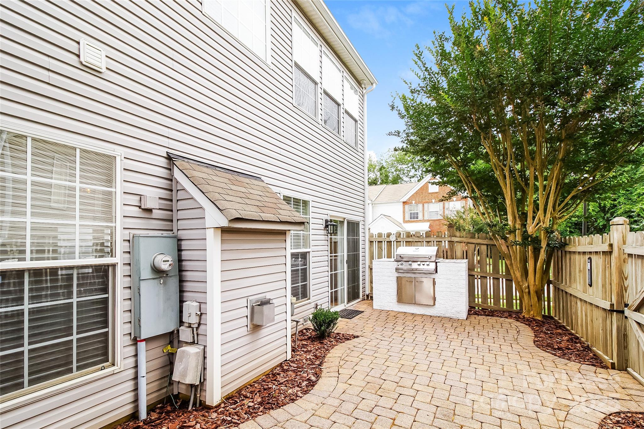 8803 Ormeau Drive Charlotte, NC 28277 - Photo 17 of 17 a view of a house with a yard