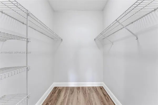 a view of a room with racks on the wall