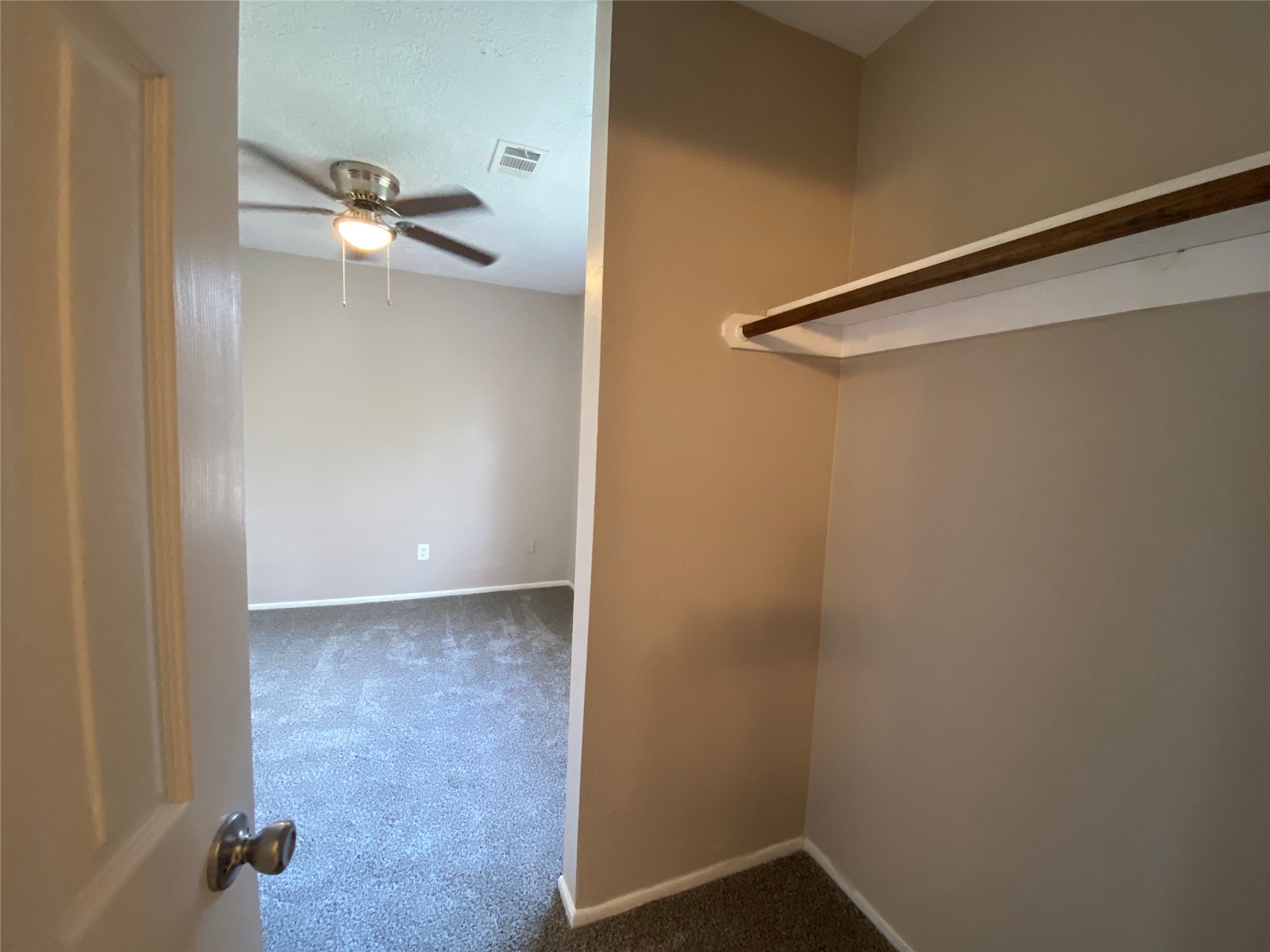 26620 Orchid Court Point Blank, TX 77364 - Photo 18 of 21 a view of a room with rack on the wall