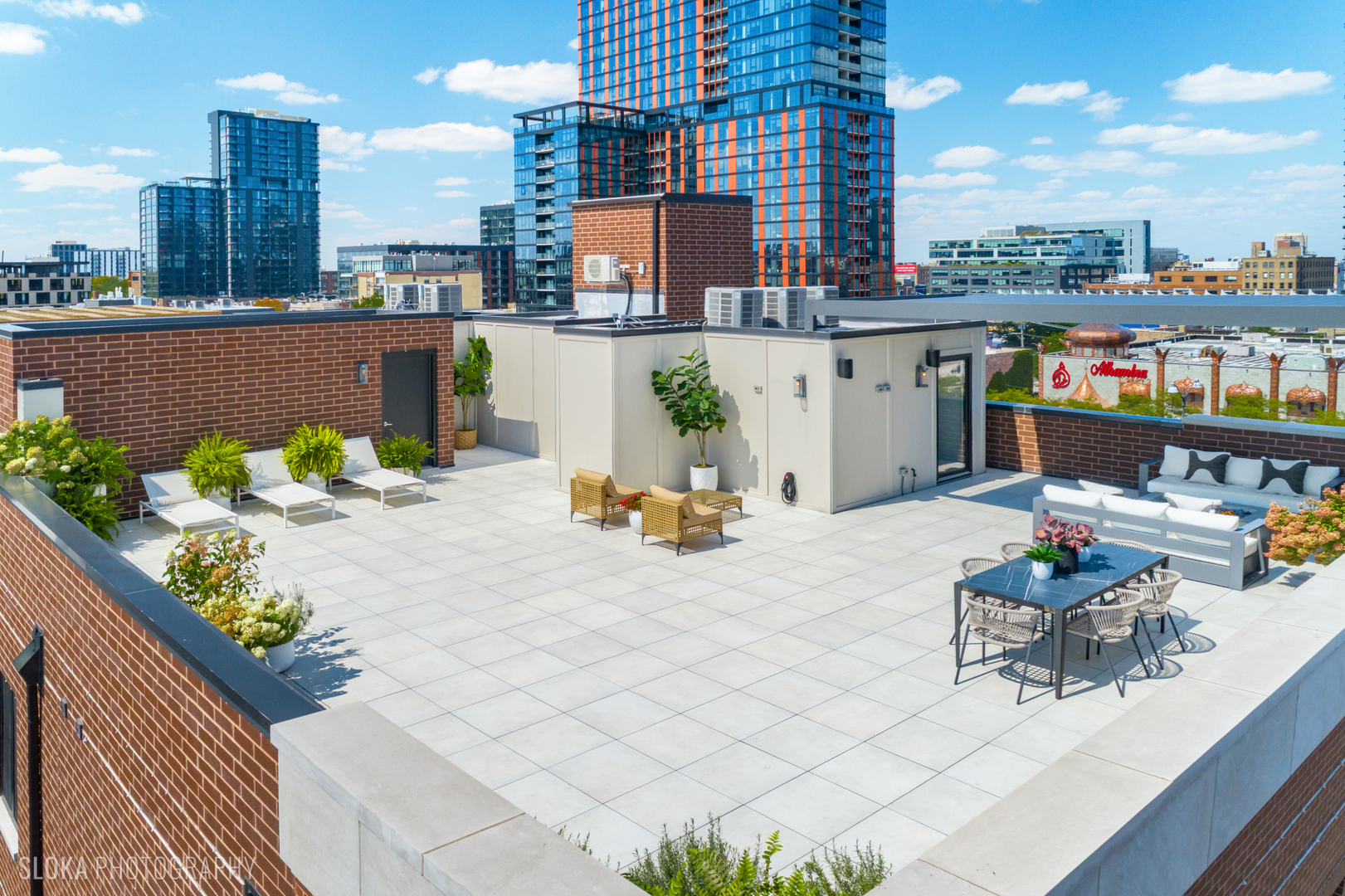 116 North Willard Court, Unit PH01 Chicago, IL 60607 - Photo 54 of 92 a view of city from terrace along with seating space