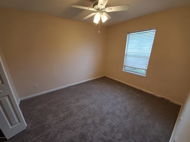 an entryway with a workspace