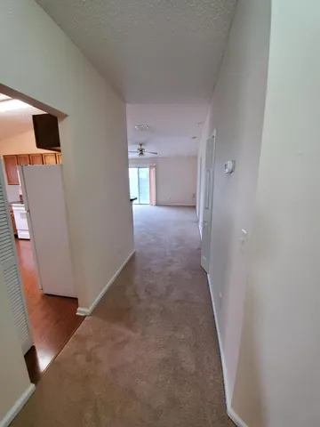 a view of a livingroom with a flat screen tv