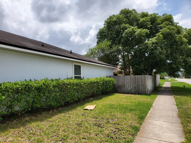 a view of backyard with green space
