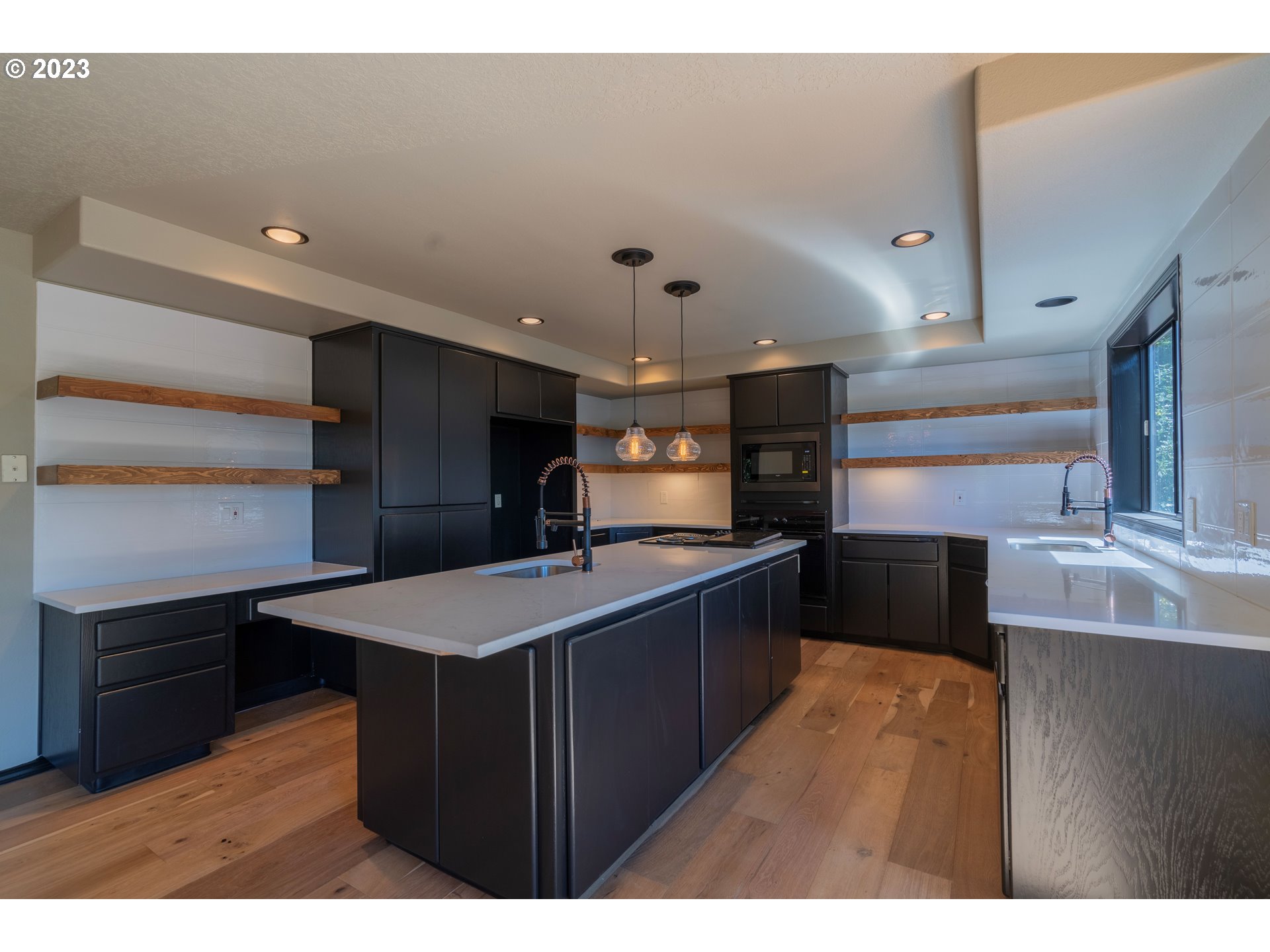19040 South Mattoon Road Estacada, OR 97023 - Photo 11 of 46 a kitchen with counter top space cabinets and stainless steel appliances