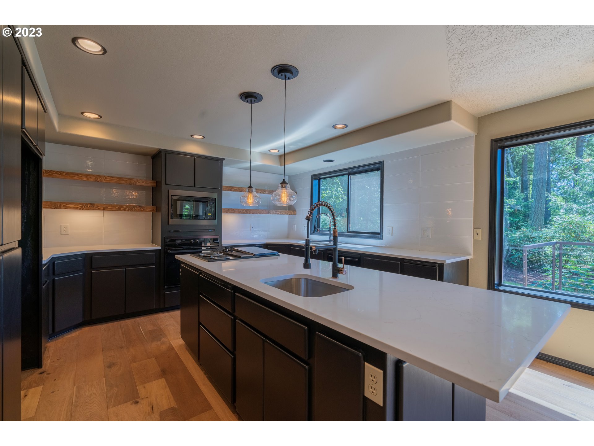 19040 South Mattoon Road Estacada, OR 97023 - Photo 13 of 46 a kitchen with a sink a counter top space and appliances