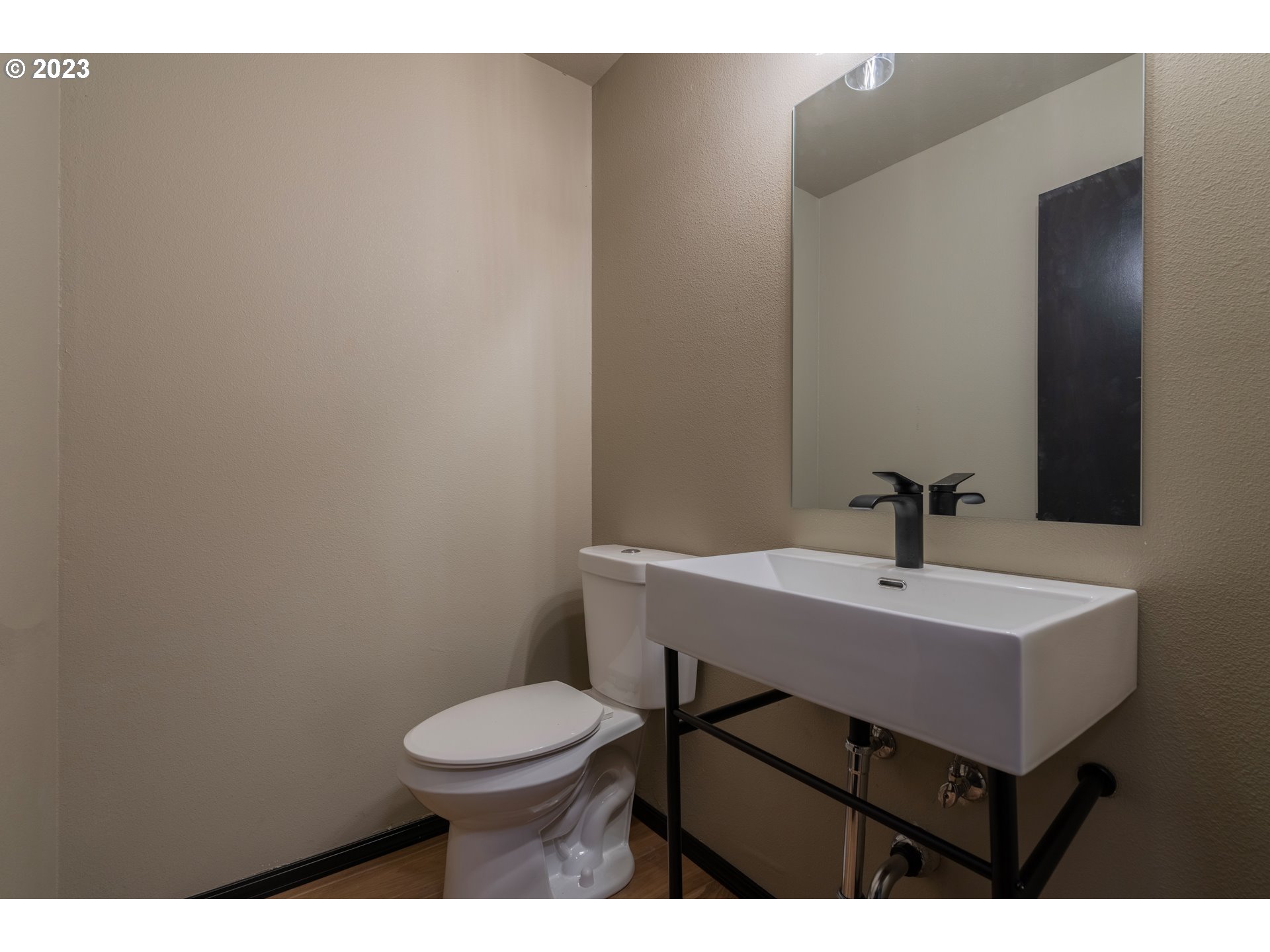 19040 South Mattoon Road Estacada, OR 97023 - Photo 31 of 46 a bathroom with a sink a toilet and mirror