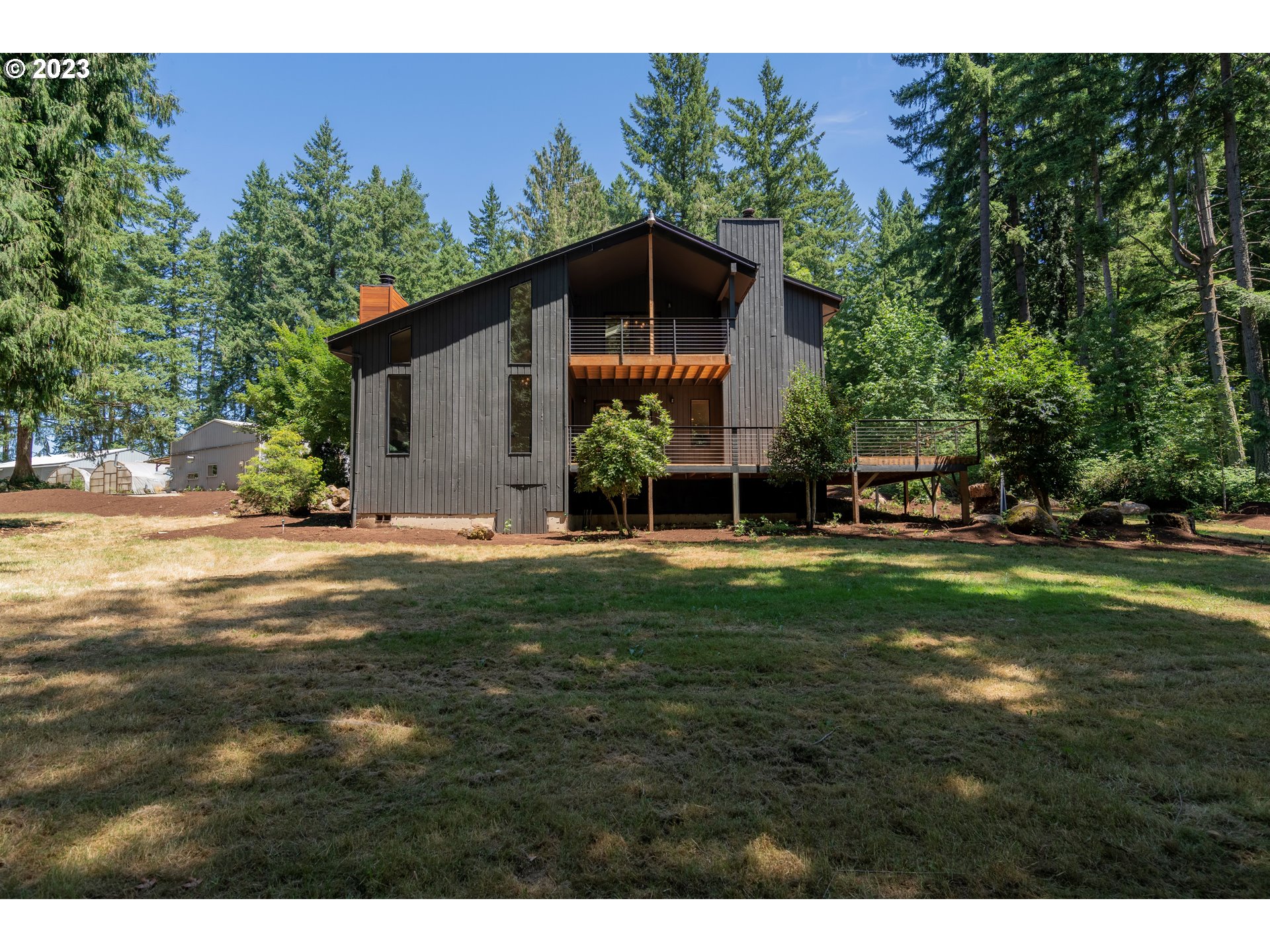 19040 South Mattoon Road Estacada, OR 97023 - Photo 36 of 46 a front view of a house with garden