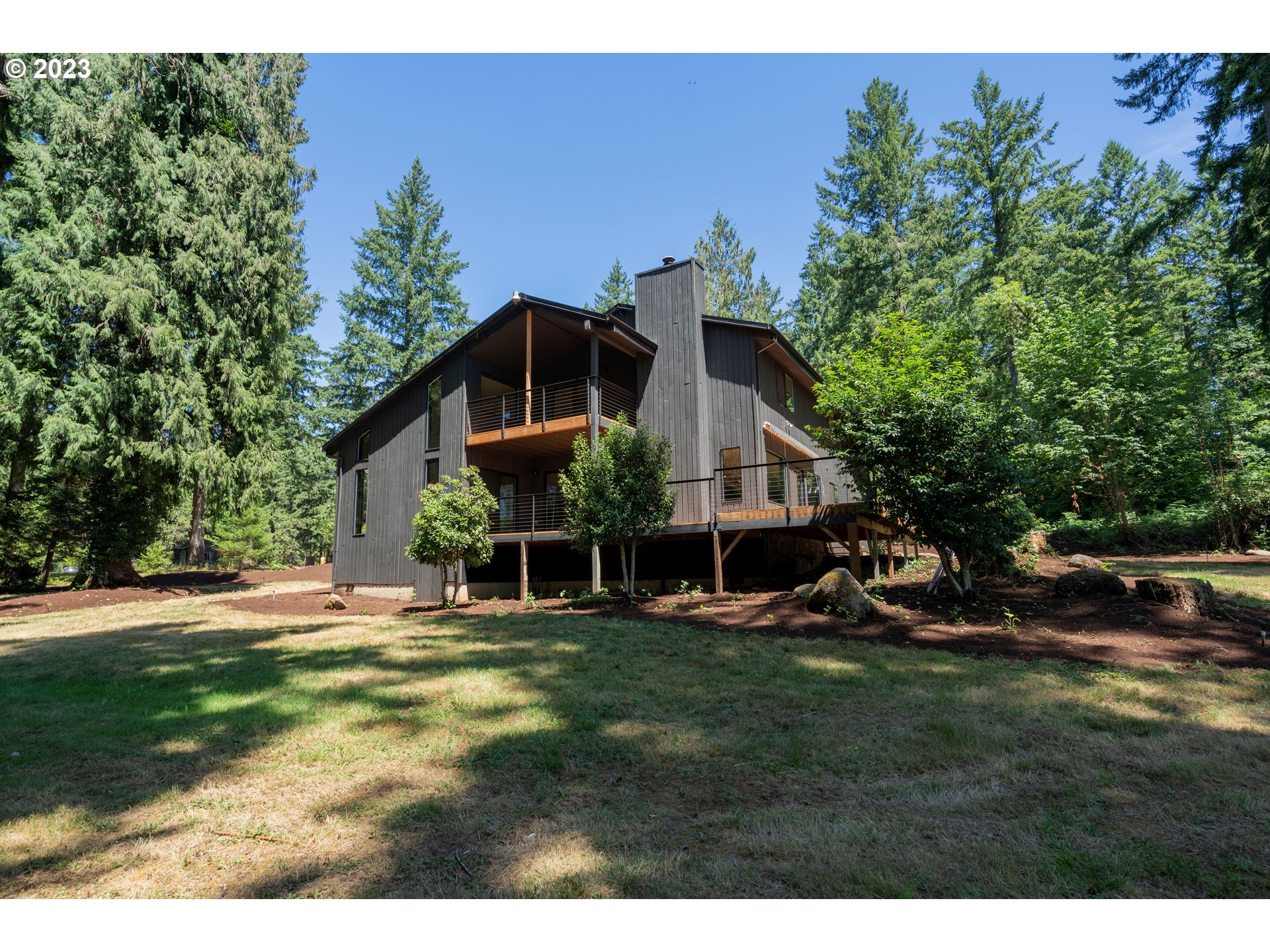 19040 South Mattoon Road Estacada, OR 97023 - Photo 37 of 46 a view of a house with a yard