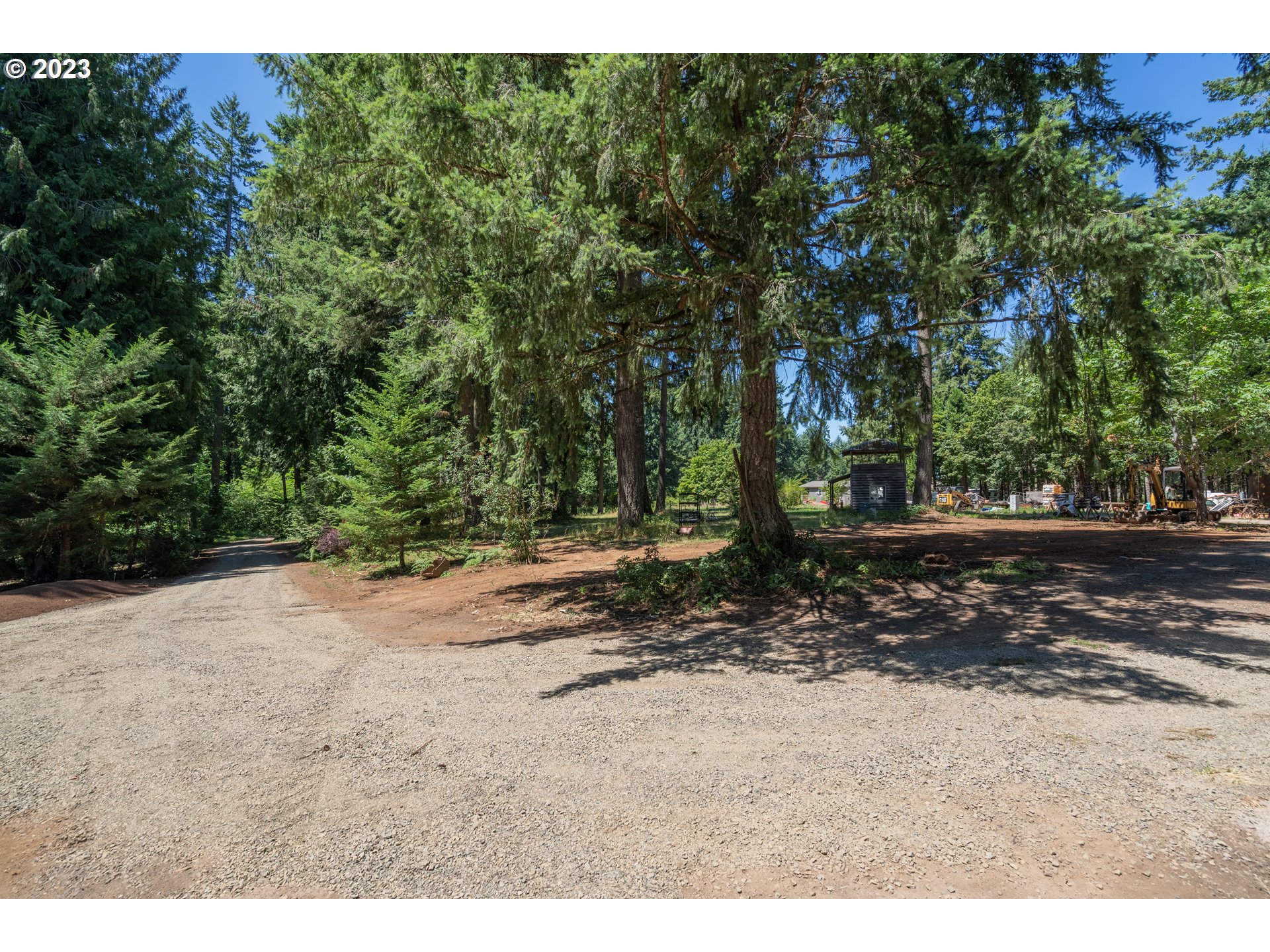 19040 South Mattoon Road Estacada, OR 97023 - Photo 41 of 46 a view of a yard with a tree