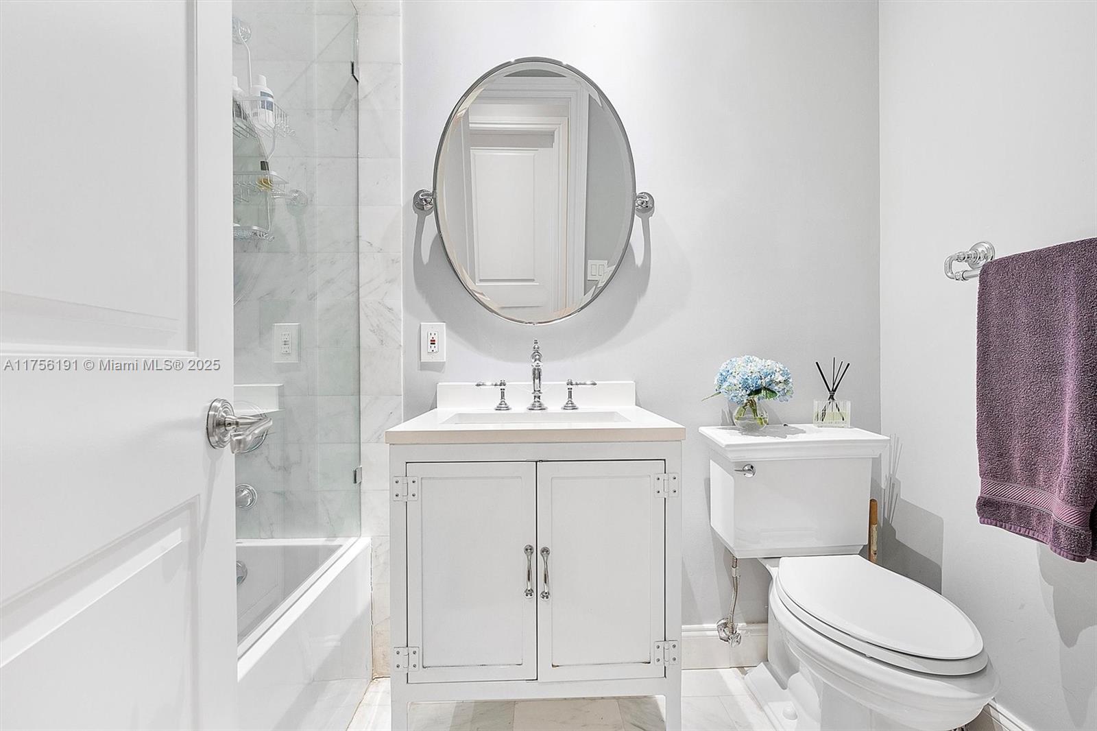 524 Hardee Road Coral Gables, FL 33146 - Photo 30 of 48 a bathroom with a sink a toilet and a mirror