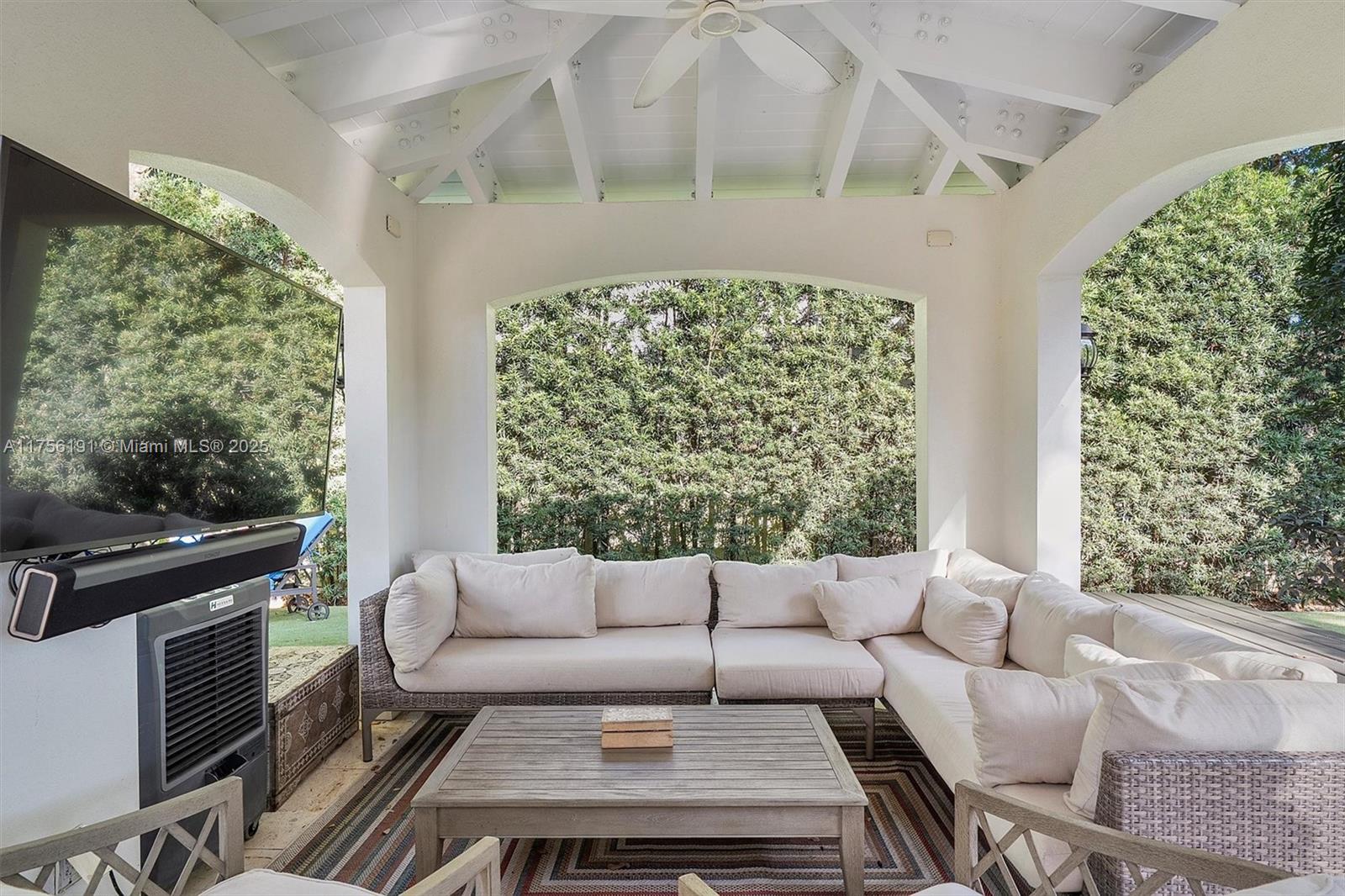 524 Hardee Road Coral Gables, FL 33146 - Photo 36 of 48 a living room with furniture and a fireplace