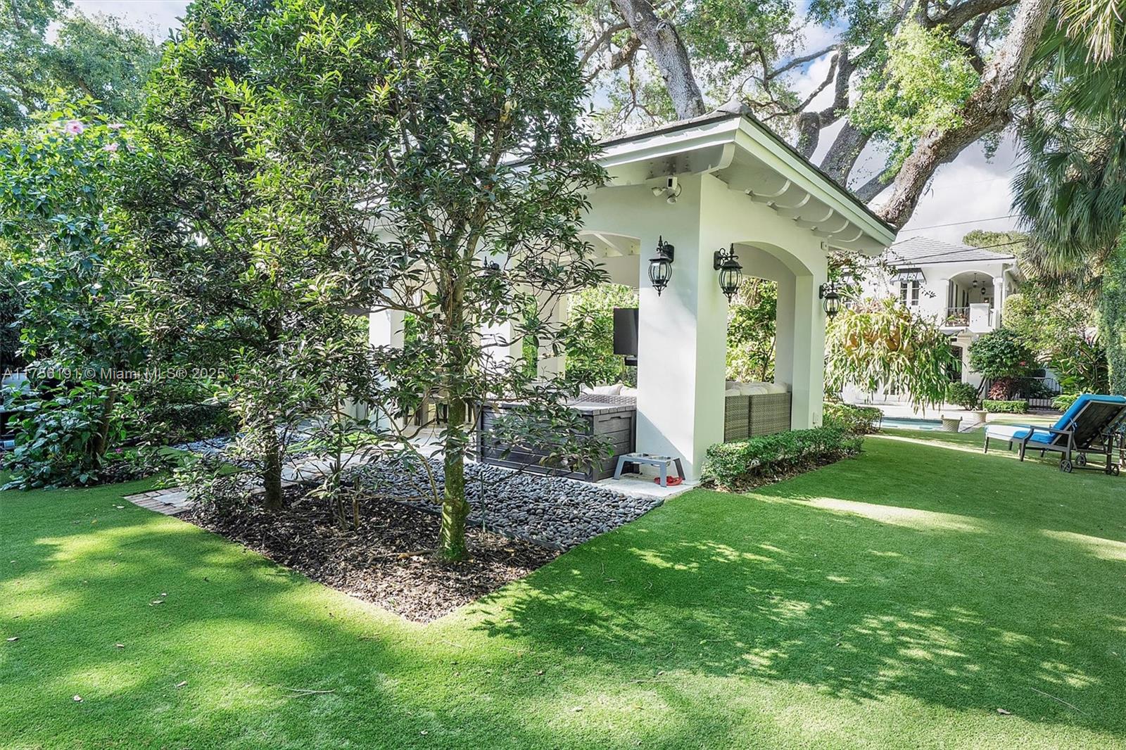 524 Hardee Road Coral Gables, FL 33146 - Photo 38 of 48 a front view of a house with a yard