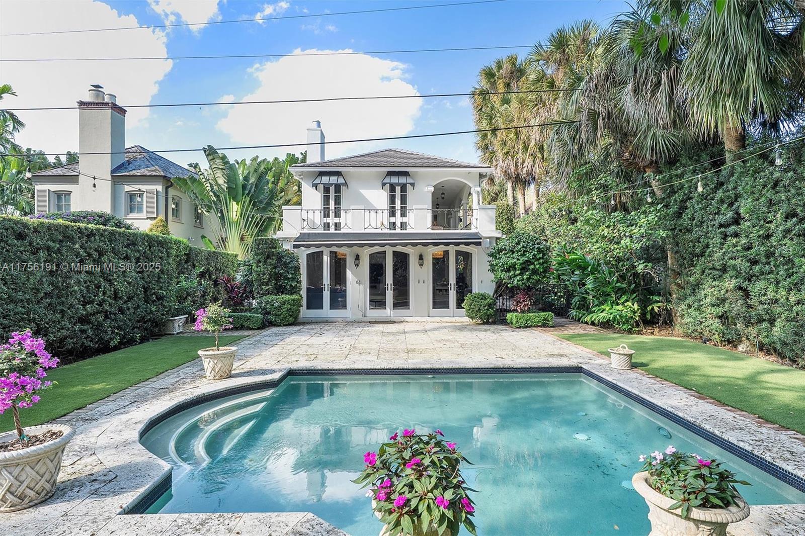 524 Hardee Road Coral Gables, FL 33146 - Photo 40 of 48 a view of house with swimming pool outdoor seating