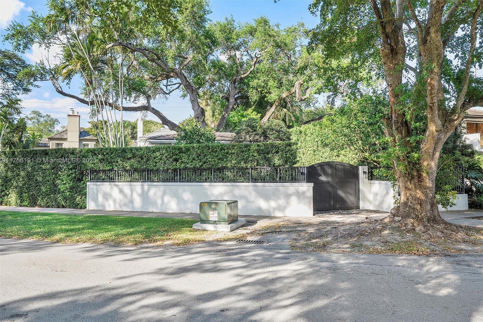 524 Hardee Road Coral Gables, FL 33146 - Photo 41 of 48 a view of a outdoor space with fountain