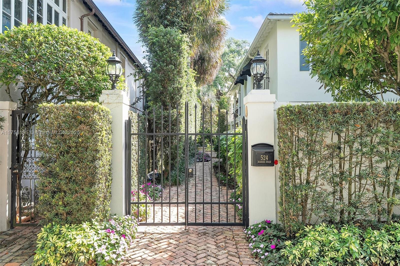 524 Hardee Road Coral Gables, FL 33146 - Photo 5 of 48 a view of a house with a garden