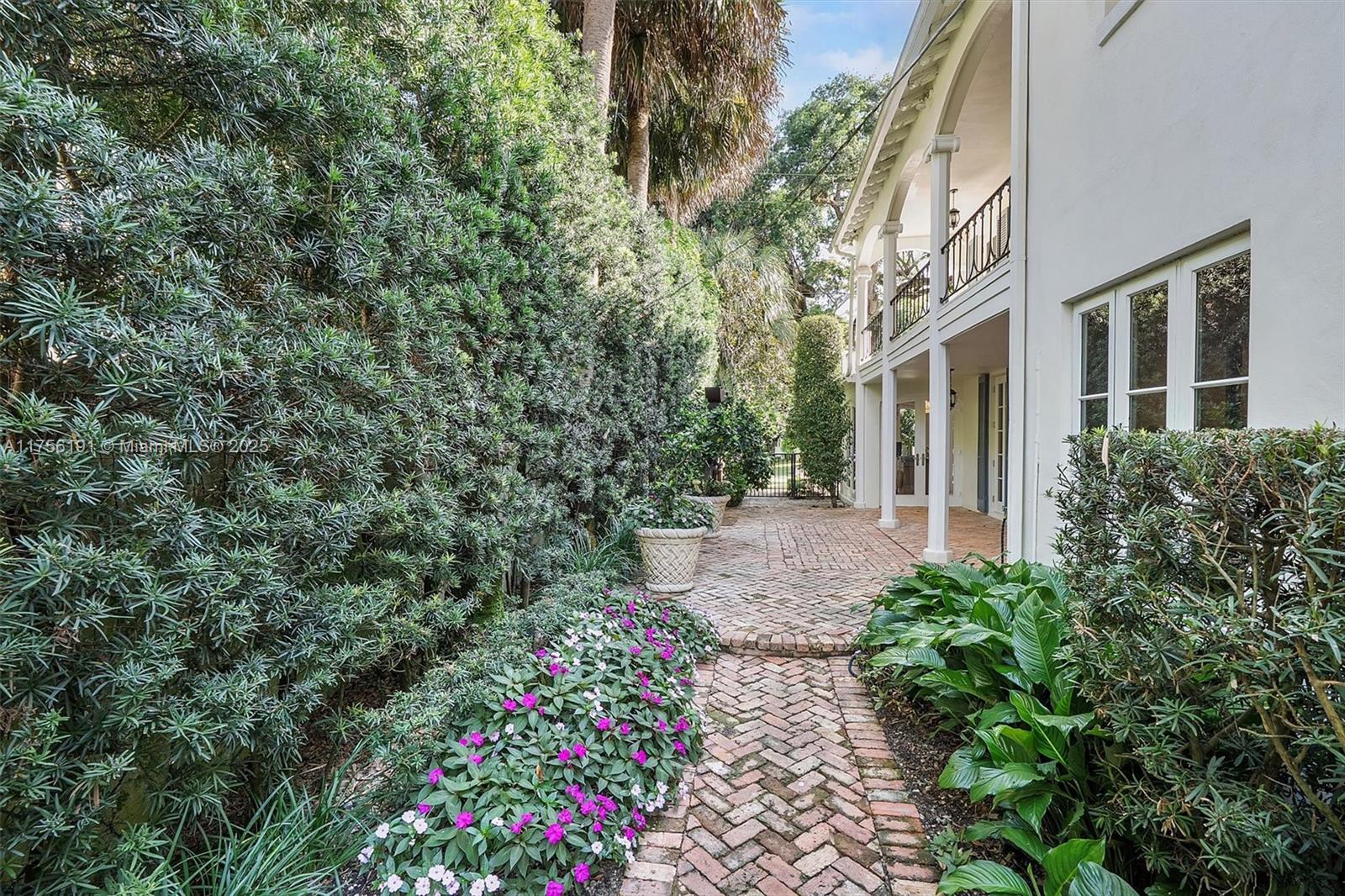 524 Hardee Road Coral Gables, FL 33146 - Photo 7 of 48 a view of a pathway in outside of the house