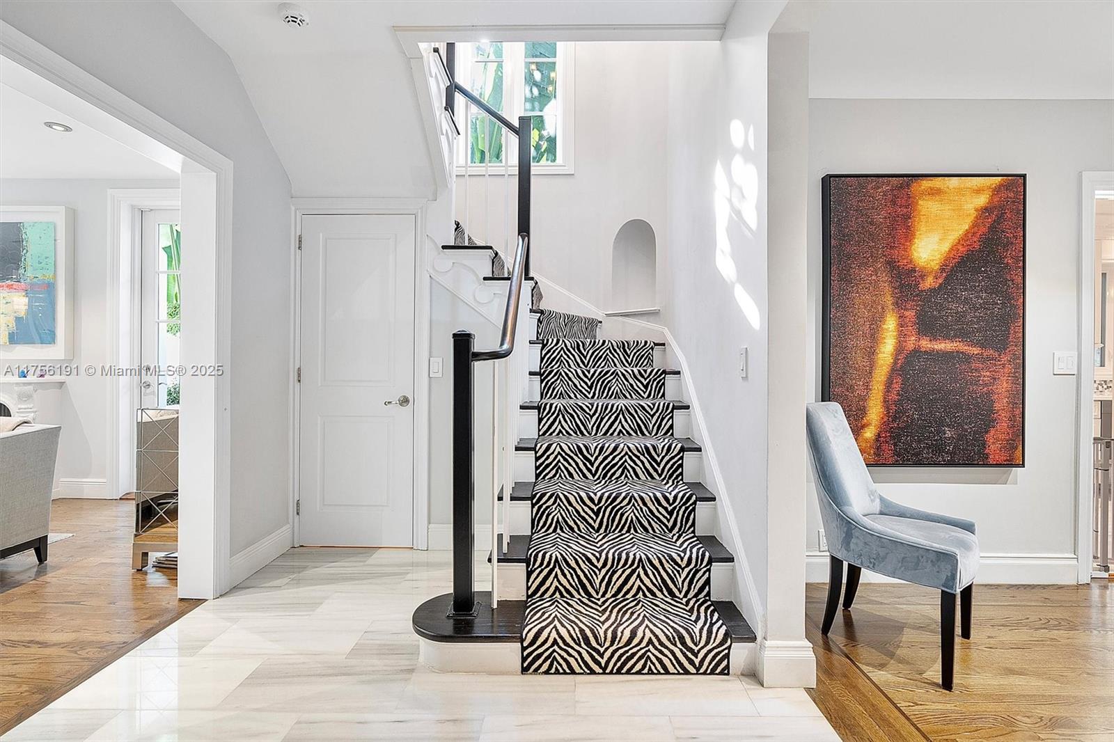 524 Hardee Road Coral Gables, FL 33146 - Photo 10 of 48 a view of entryway with wooden floor and a rug