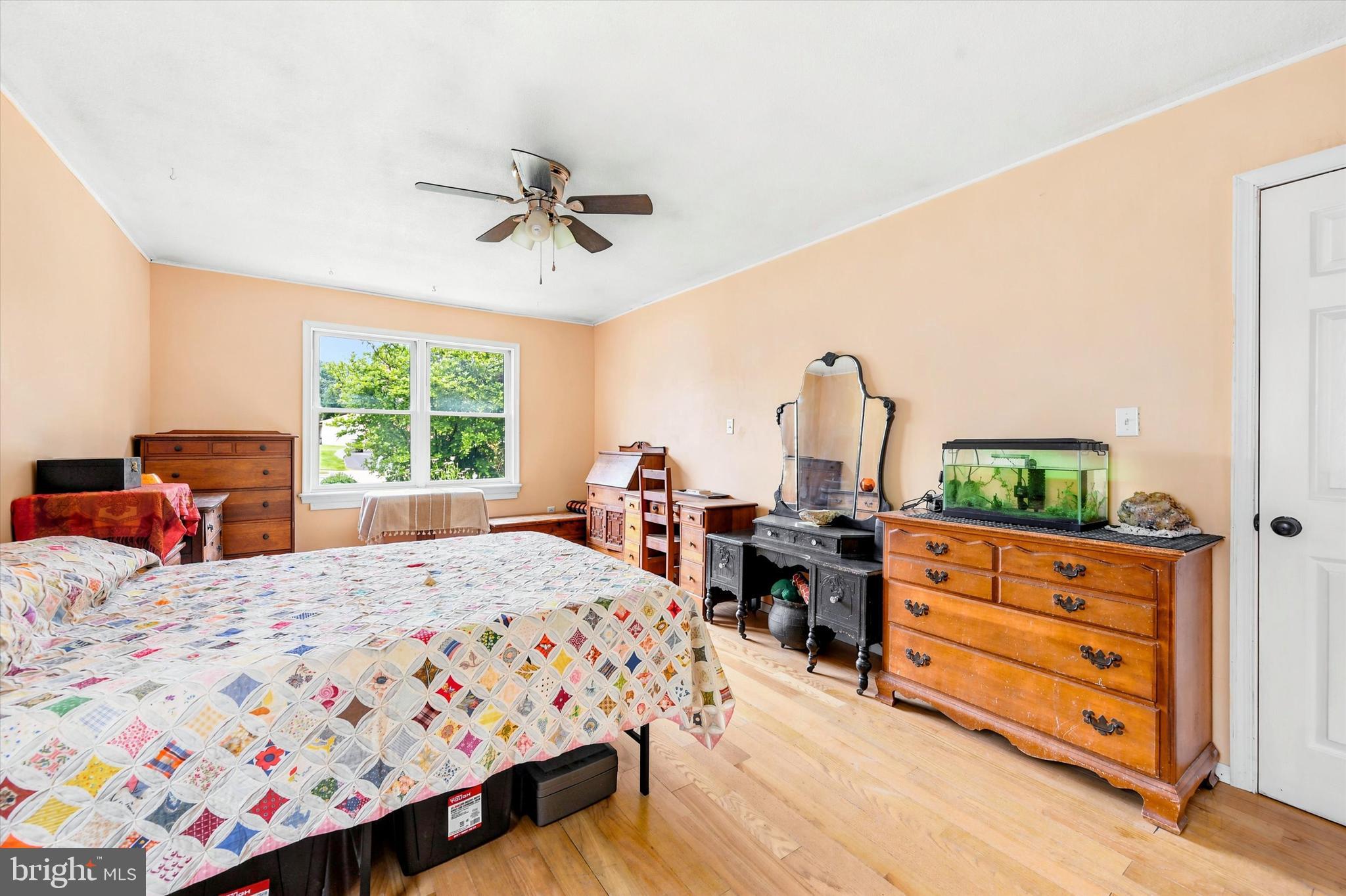 319 Willowbrook Road Upper Chichester, PA 19061 - Photo 13 of 24 a bedroom with a bed and a dresser in it