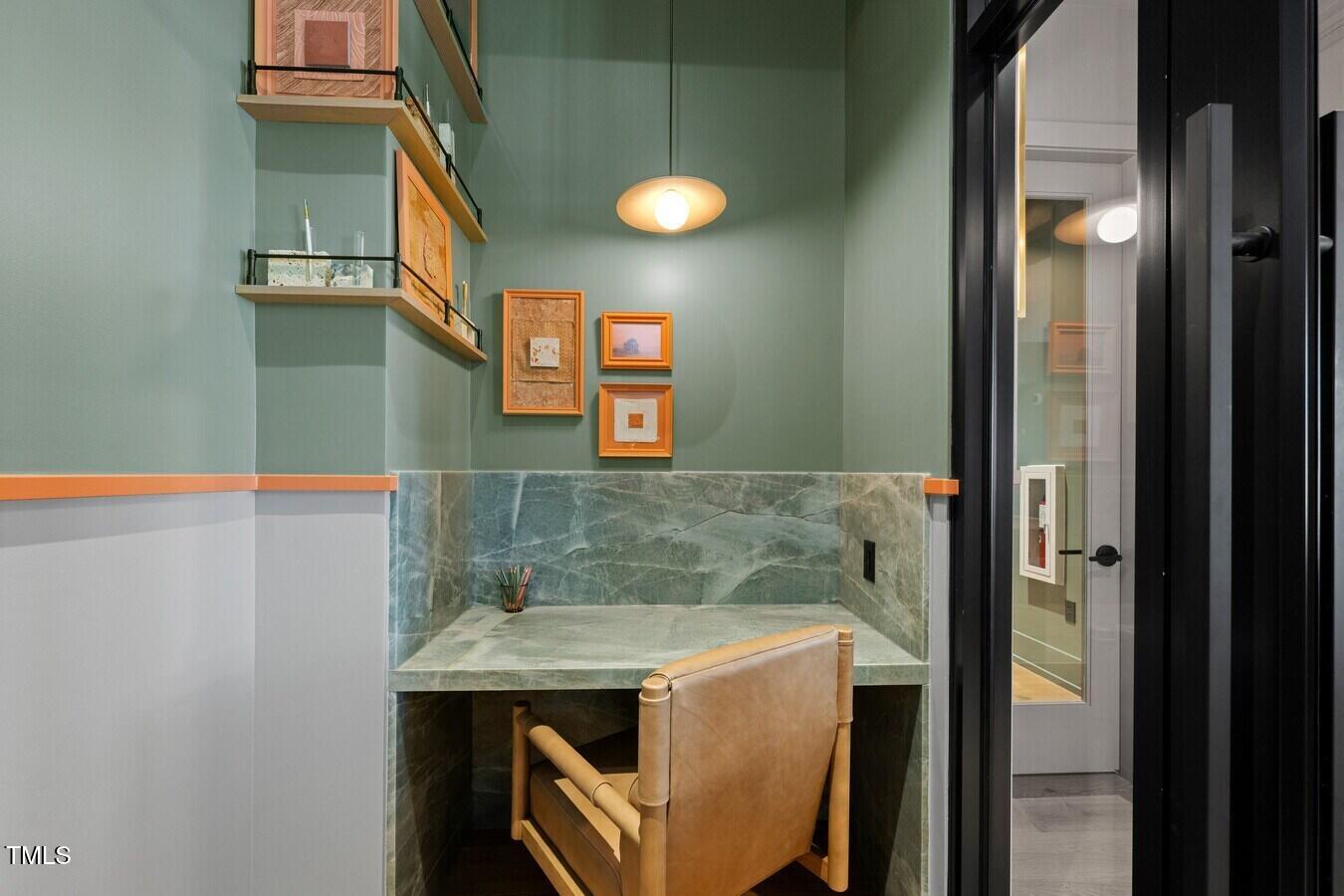 3901 Capital Hills Drive, Unit C1A Raleigh, NC 27616 - Photo 12 of 35 a bathroom with a sink and a mirror