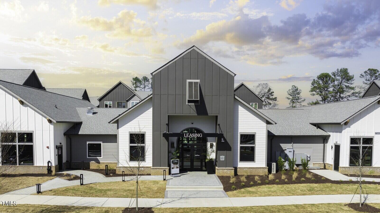 3901 Capital Hills Drive, Unit C1A Raleigh, NC 27616 - Photo 15 of 35 a front view of the house with a yard