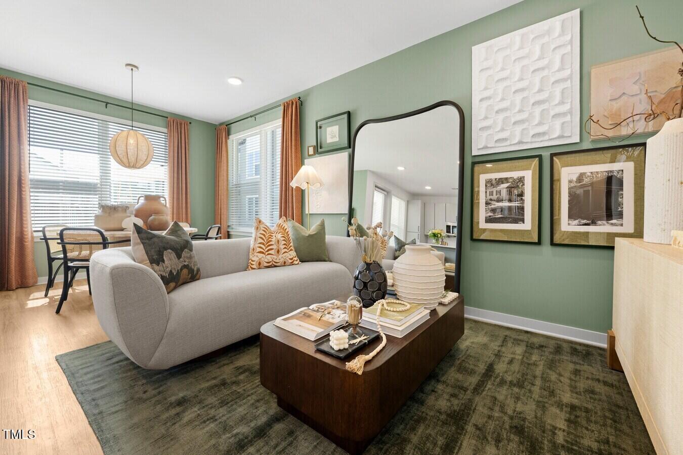 3901 Capital Hills Drive, Unit C1A Raleigh, NC 27616 - Photo 19 of 35 a living room with furniture and a large window