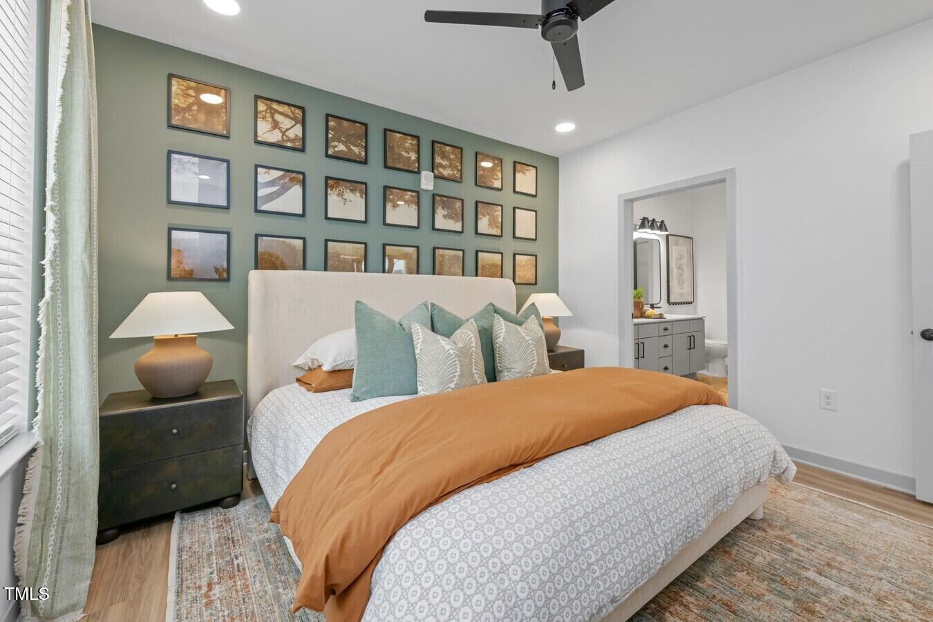 3901 Capital Hills Drive, Unit C1A Raleigh, NC 27616 - Photo 20 of 35 a bedroom with bed and a book shelf
