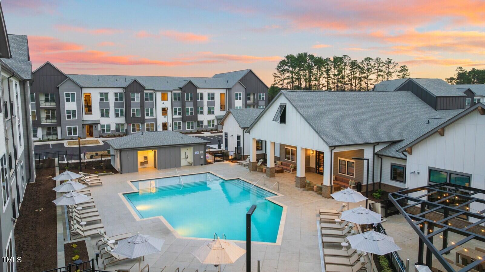 3901 Capital Hills Drive, Unit C1A Raleigh, NC 27616 - Photo 2 of 35 an aerial view of a house with swimming pool outdoor seating