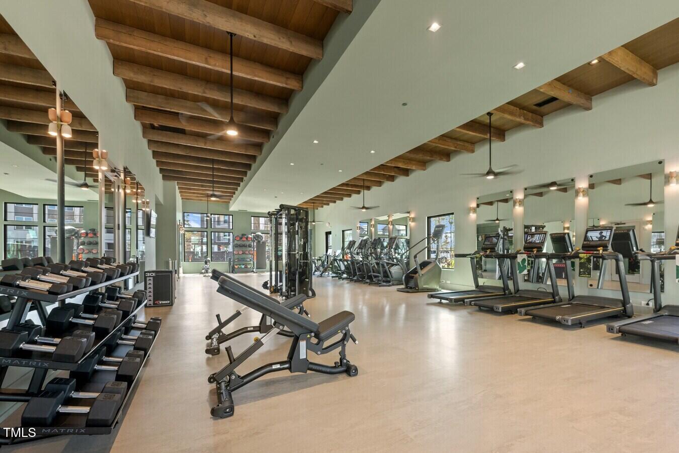 3901 Capital Hills Drive, Unit C1A Raleigh, NC 27616 - Photo 5 of 35 a view of a room with gym equipment