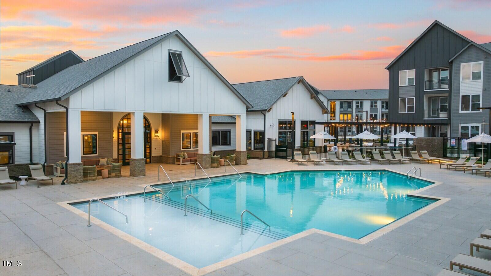 3901 Capital Hills Drive, Unit C1A Raleigh, NC 27616 - Photo 8 of 35 a view of a patio with swimming pool table and chairs