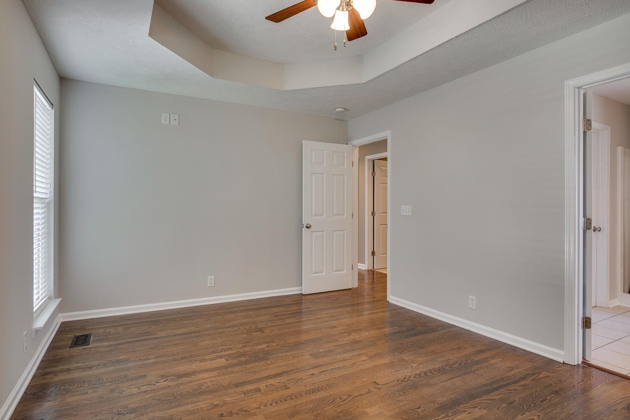 391 Abbie Road Murfreesboro, TN 37128 - Photo 18 of 30 wooden floor in an empty room