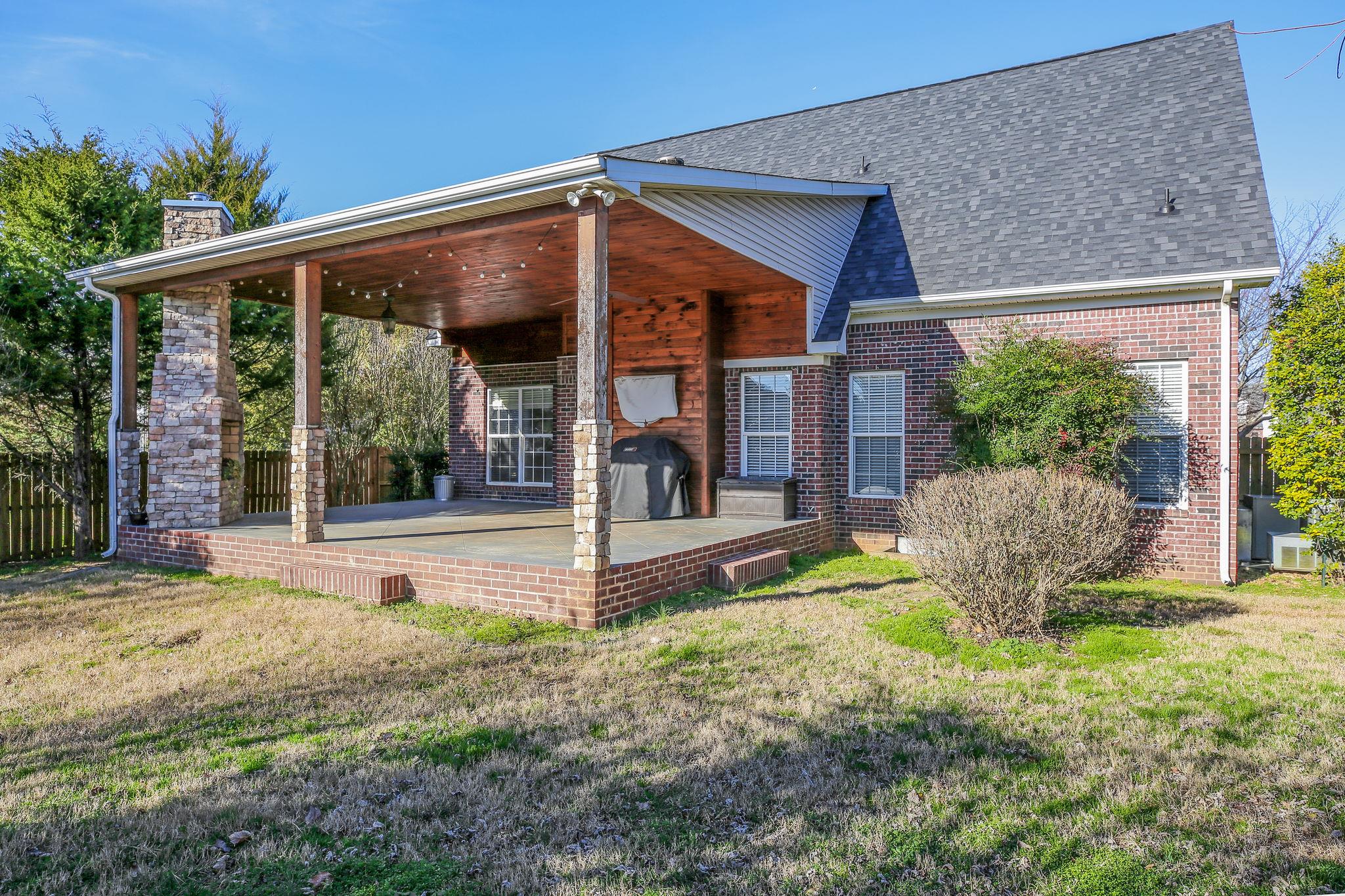 391 Abbie Road Murfreesboro, TN 37128 - Photo 25 of 30 a view of a house with backyard and porch