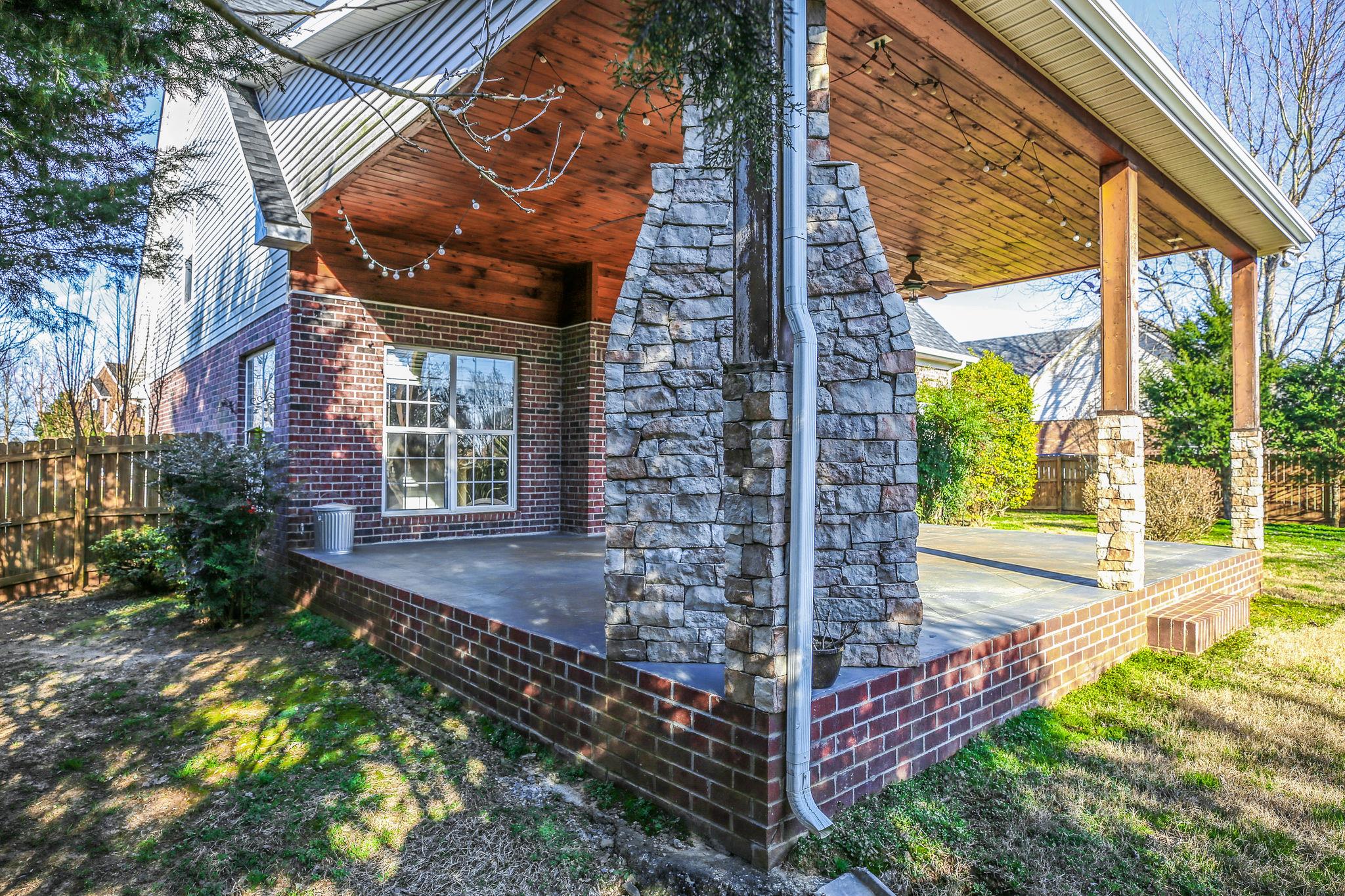 391 Abbie Road Murfreesboro, TN 37128 - Photo 27 of 30 a view of a house with backyard and porch