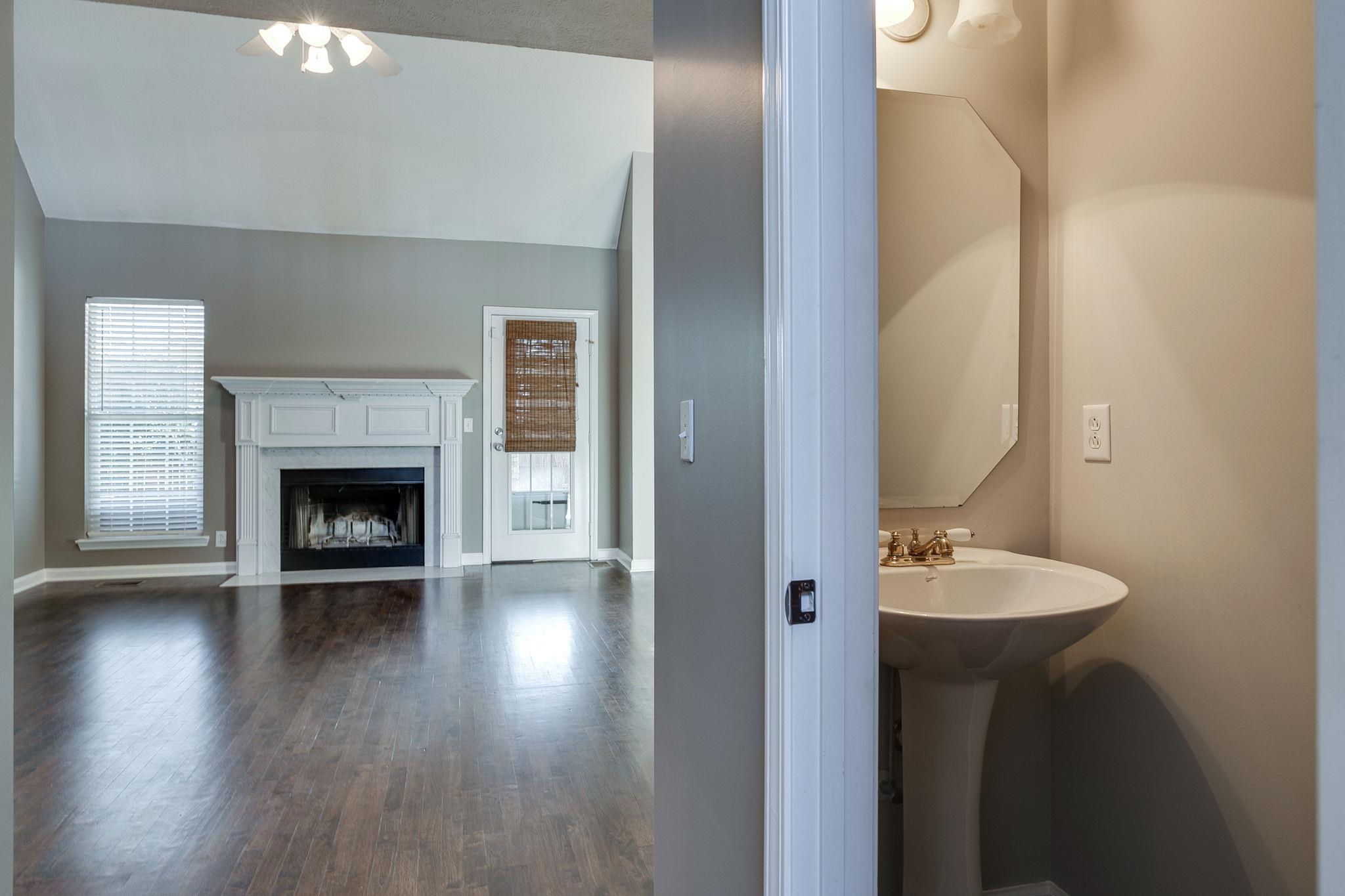 391 Abbie Road Murfreesboro, TN 37128 - Photo 8 of 30 a bathroom with a sink and a mirror
