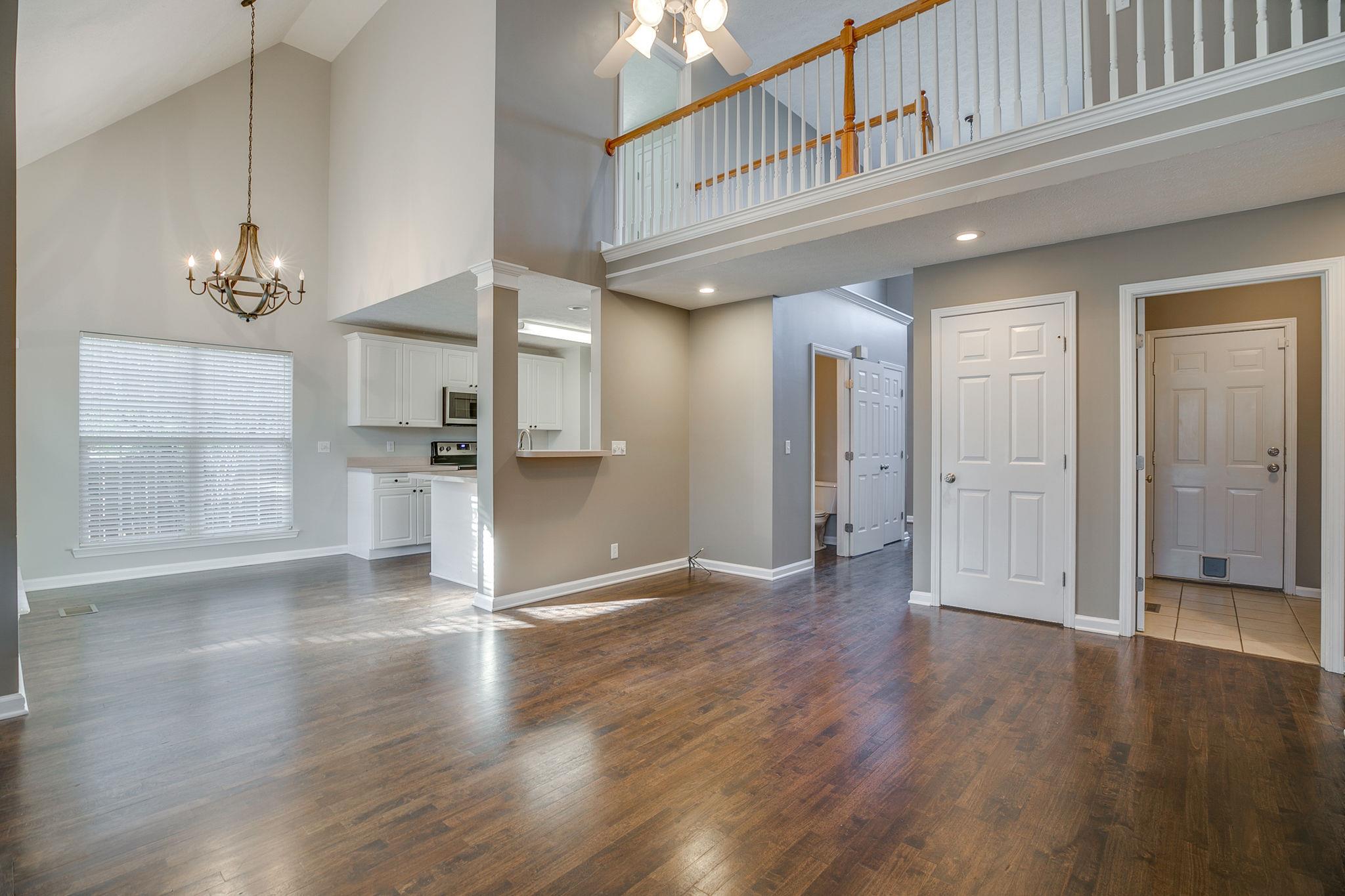 391 Abbie Road Murfreesboro, TN 37128 - Photo 30 of 30 a view of a hallway with wooden floor
