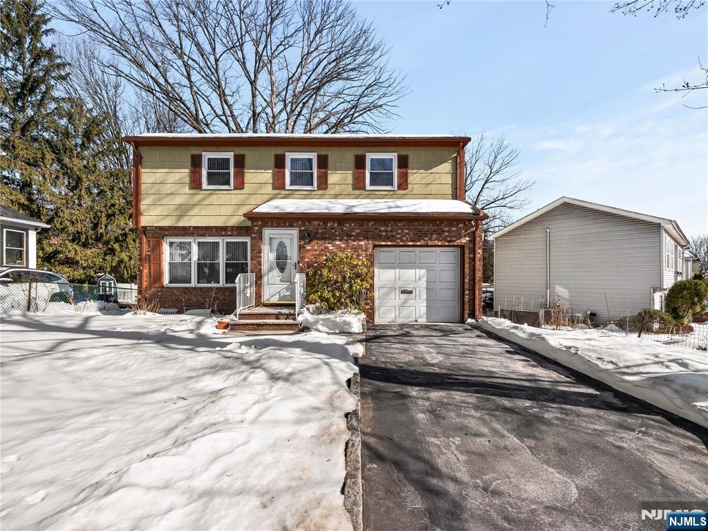 5 Woodland Road Bloomfield, NJ 07003 - Photo 1 of 30 a front view of a house with a yard