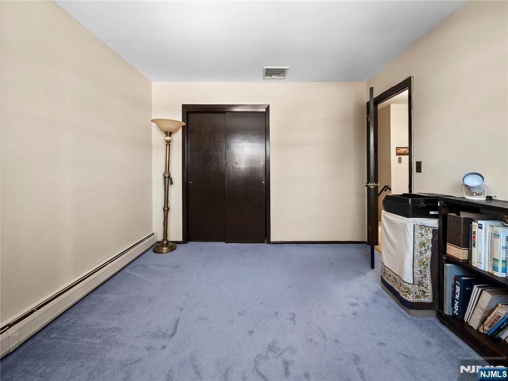 5 Woodland Road Bloomfield, NJ 07003 - Photo 22 of 30 a view of an empty room with working area