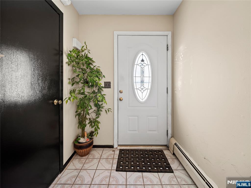 5 Woodland Road Bloomfield, NJ 07003 - Photo 23 of 30 a view of a room with wooden floor and window