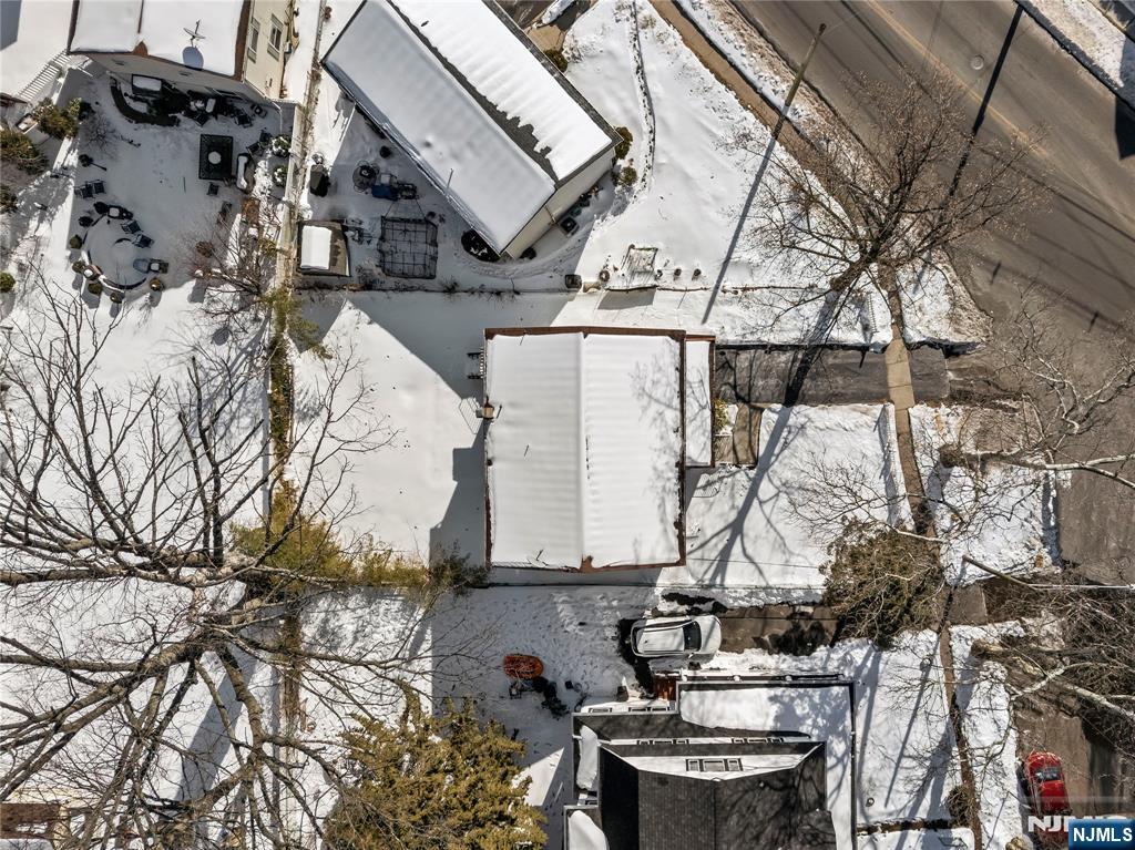 5 Woodland Road Bloomfield, NJ 07003 - Photo 29 of 30 a view of a house with a snow