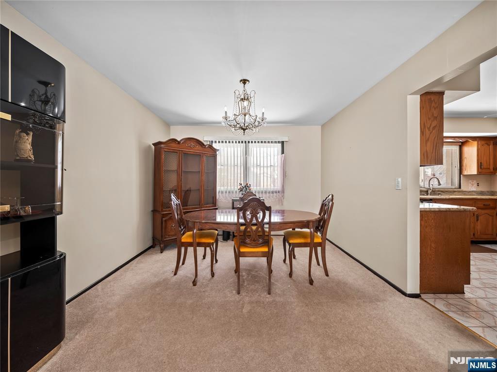 5 Woodland Road Bloomfield, NJ 07003 - Photo 7 of 30 a view of a dining room with furniture window and outside view