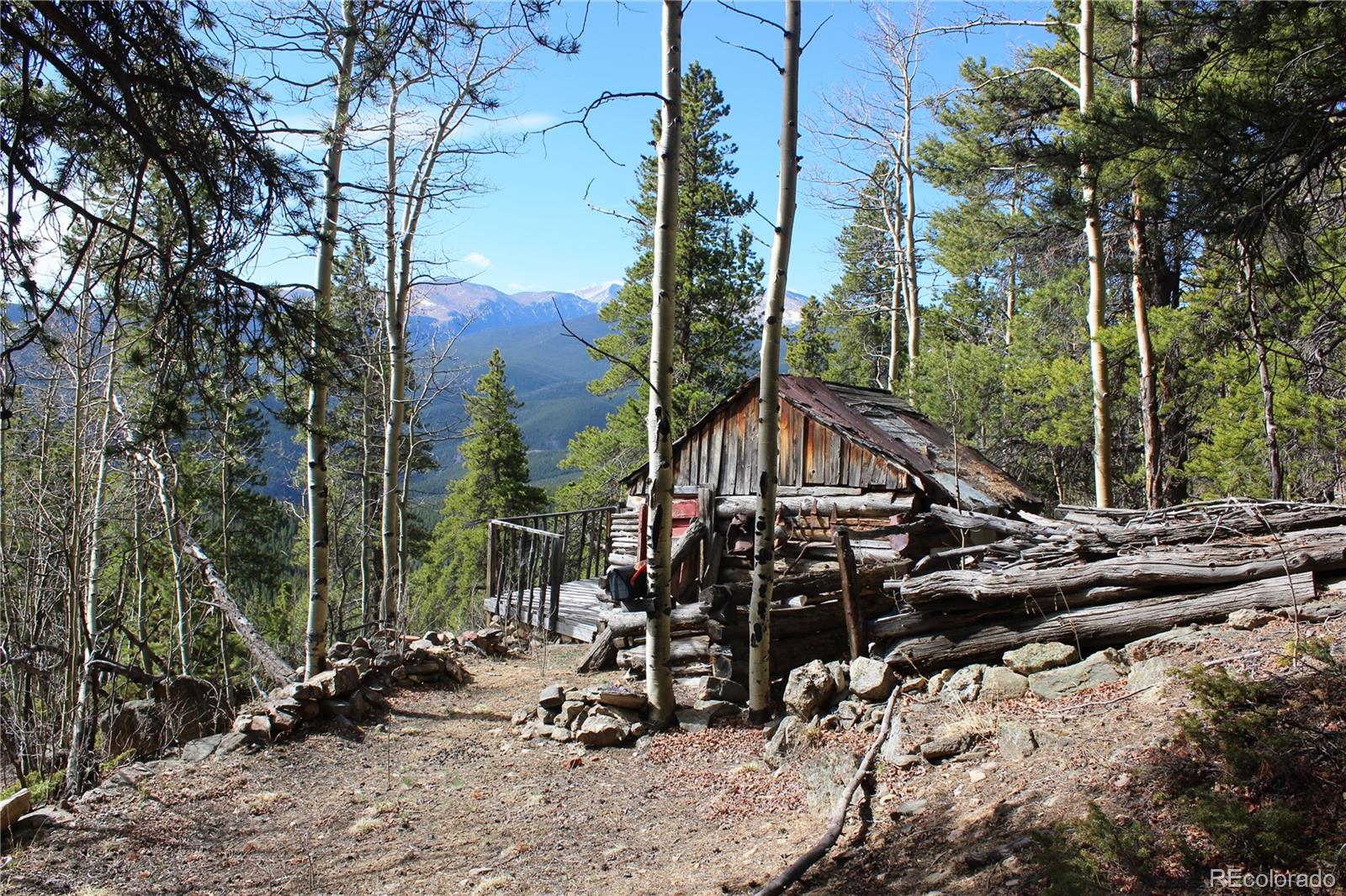 4-1 Lamartine Road Idaho Springs, CO 80452 - Photo 19 of 22 a view of outdoor space with seating area and trees around