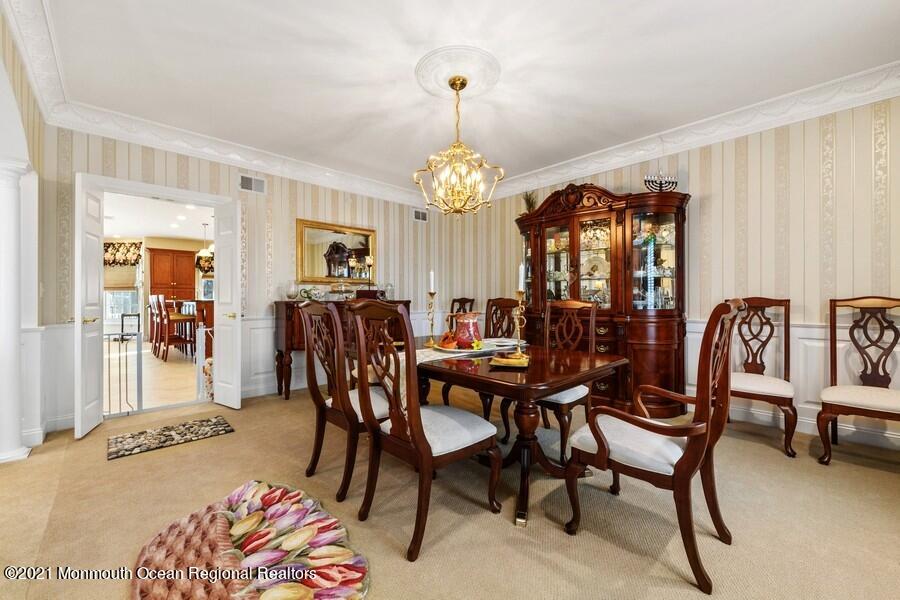 179 Stone Hill Road Colts Neck, NJ 07722 - Photo 16 of 57 a view of a dining room with furniture