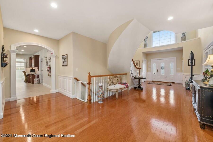 179 Stone Hill Road Colts Neck, NJ 07722 - Photo 26 of 57 a view of a living room and dining room