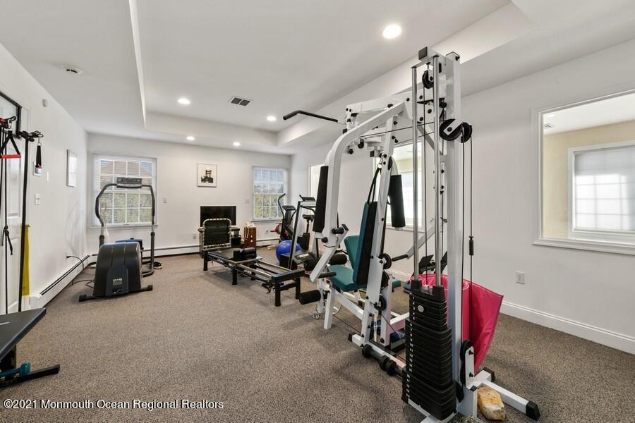179 Stone Hill Road Colts Neck, NJ 07722 - Photo 28 of 57 a view of a room with gym equipment